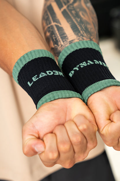 WRISTBAND DINAMYC (muñequera de sudor) Negra con Vede Salvía
